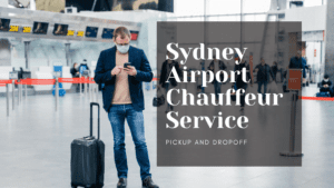 Man standing in crowded airport, uses phone to check checking Sydney Airport Chauffeur Service Online